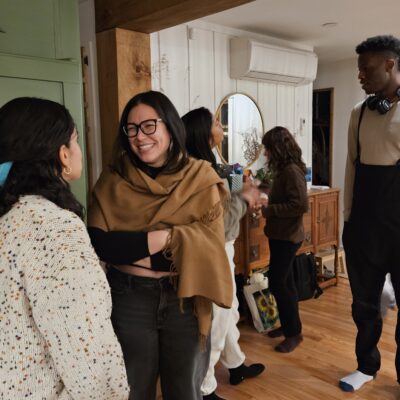 A candid photo of people involved in different conversations